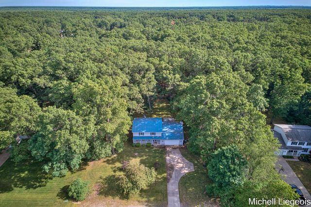 3325 S Riverwood Drive, Twin Lake, MI 49457