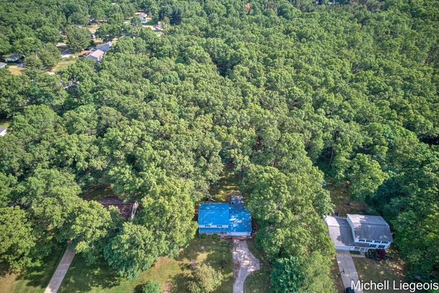 3325 S Riverwood Drive, Twin Lake, MI 49457