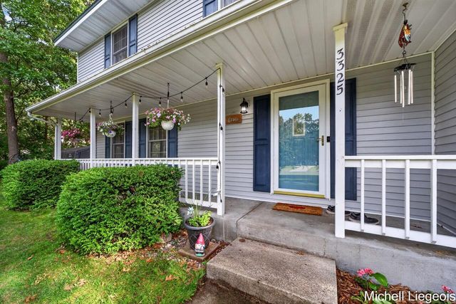 3325 S Riverwood Drive, Twin Lake, MI 49457
