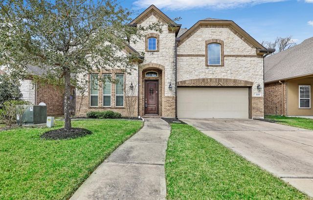 22015 Rustling Springs Drive, Spring, TX 77389