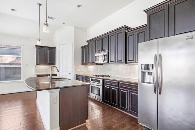 22015 Rustling Springs Drive, Spring, TX 77389