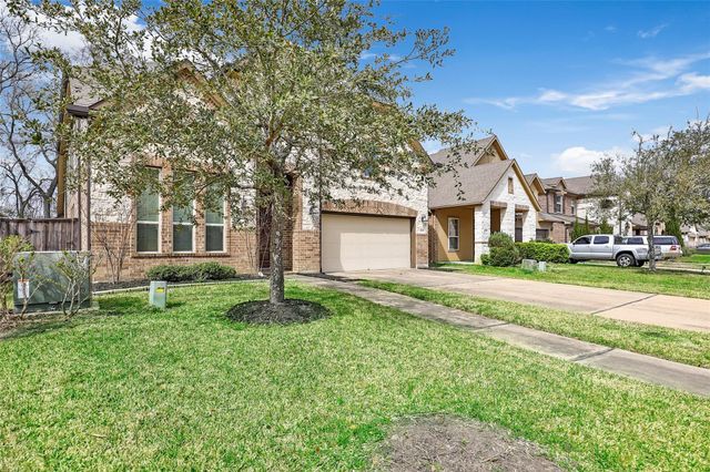 22015 Rustling Springs Drive, Spring, TX 77389