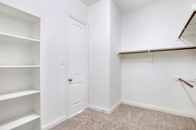 22015 Rustling Springs Drive, Spring, TX 77389