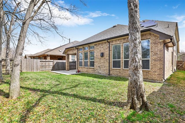 22015 Rustling Springs Drive, Spring, TX 77389