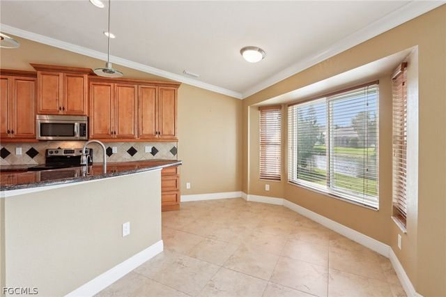 5118 Harrogate CT, Naples, FL 34112