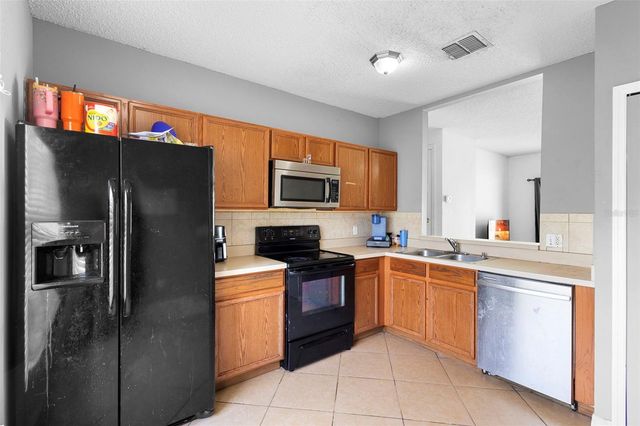 1040 CANNOCK DRIVE, Kissimmee, FL 34758