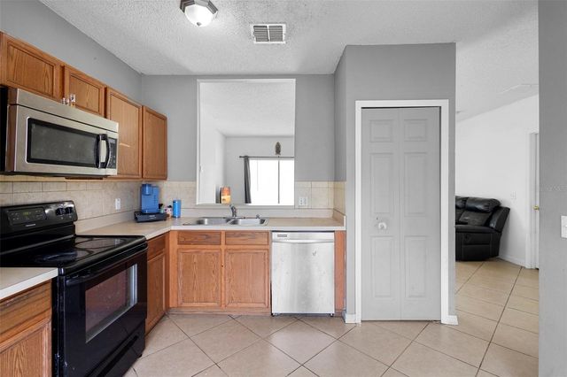 1040 CANNOCK DRIVE, Kissimmee, FL 34758