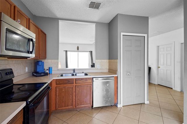 1040 CANNOCK DRIVE, Kissimmee, FL 34758