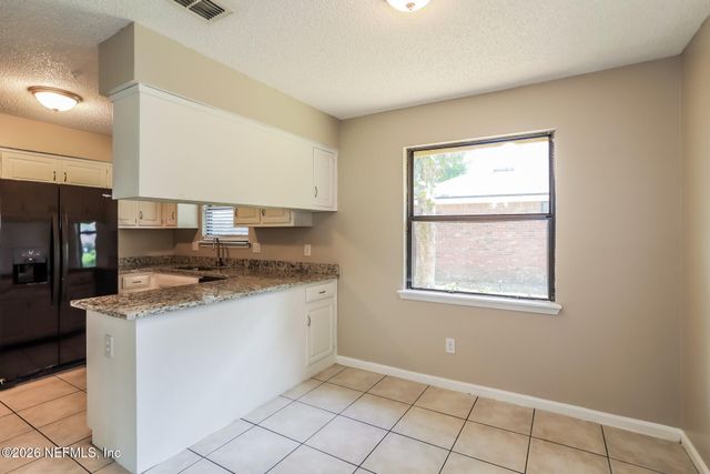 7213 SECRET WOODS Drive, Jacksonville, FL 32216