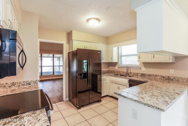 7213 SECRET WOODS Drive, Jacksonville, FL 32216