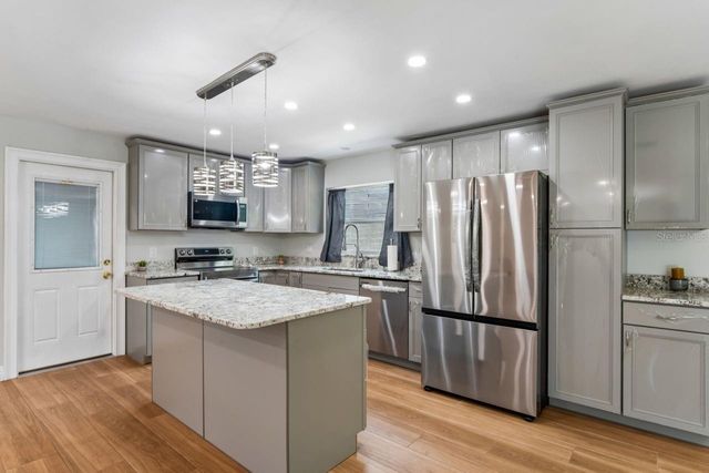 6955 BOTTLE BRUSH DRIVE, Port Richey, FL 34668
