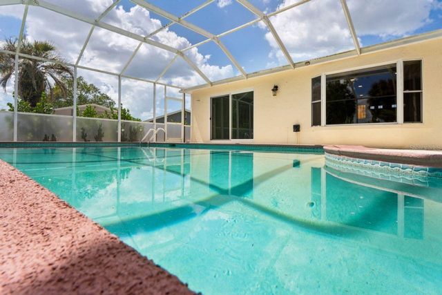6955 BOTTLE BRUSH DRIVE, Port Richey, FL 34668