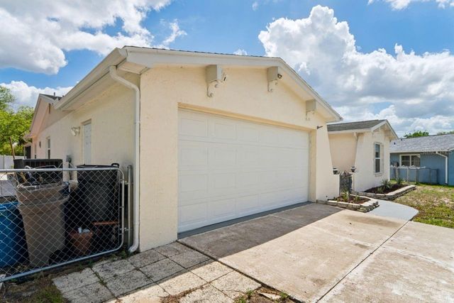 6955 BOTTLE BRUSH DRIVE, Port Richey, FL 34668