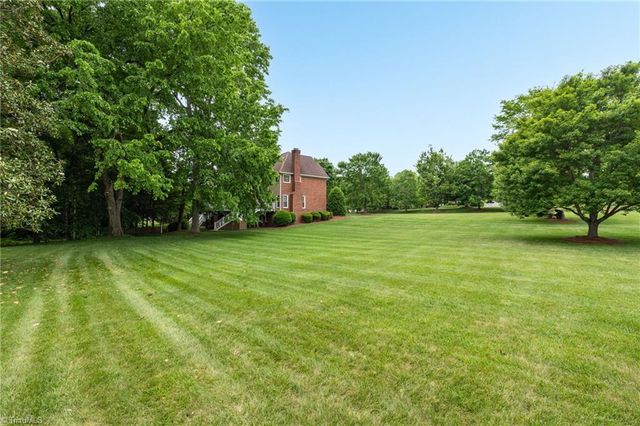 5202 Northforest Drive, Mcleansville, NC 27301