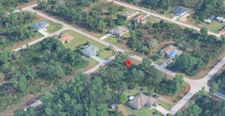1142 Cove ST E, Lehigh Acres, FL 33974