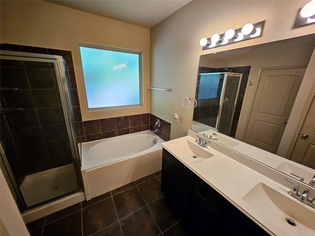 9505 E Woodmark, Conroe, TX 77304