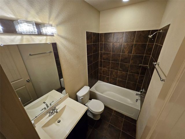 9505 E Woodmark, Conroe, TX 77304