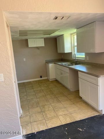 911 New Castle Court, Holly Hill, FL 32117