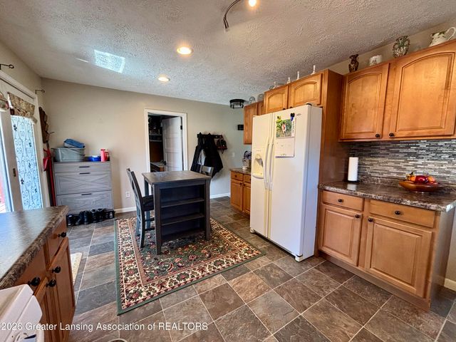 2201 N Aurelius Road, Holt, MI 48842