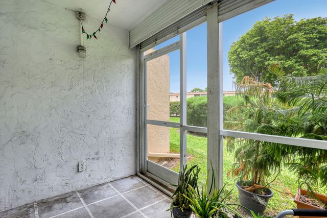 400 VILLAGE GREEN Circle W 117, Palm Springs, FL 33461