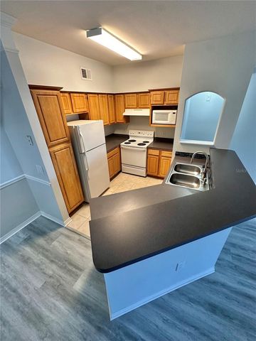 6413 ASTOR VILLAGE AVENUE 203, Orlando, FL 32835