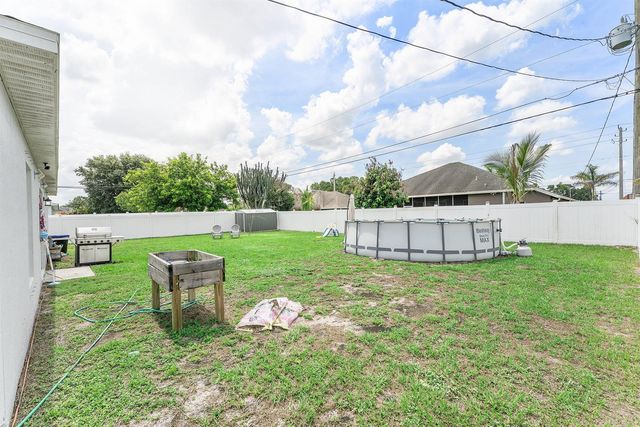 1556 SW Crater Avenue, Port St. Lucie, FL 34953
