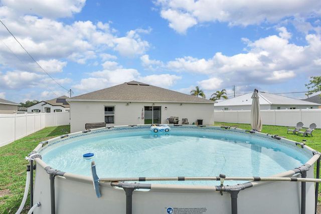 1556 SW Crater Avenue, Port St. Lucie, FL 34953