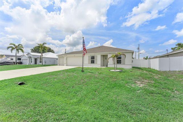 1556 SW Crater Avenue, Port St. Lucie, FL 34953