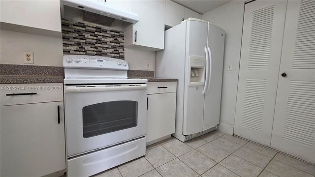 5011 Wiles Rd 203, Coconut Creek, FL 33073