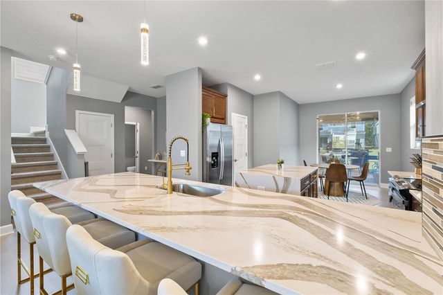 13058 PERGOLA AVENUE, Orlando, FL 32832