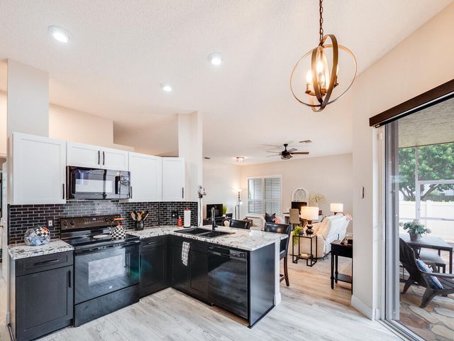 1169 MOURNING DOVE Lane, Wellington, FL 33414