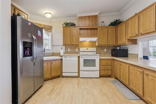 212 PALM MEADOWS DRIVE, Eustis, FL 32726