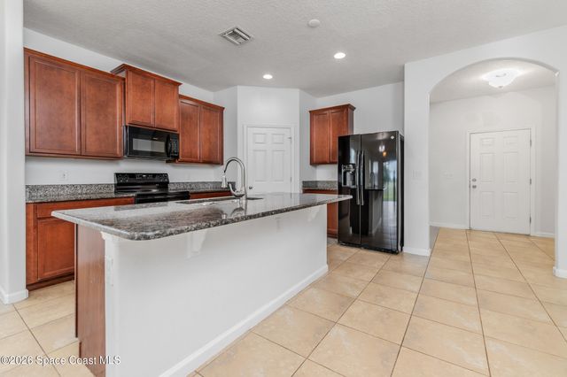 1623 Musgrass Circle, West Melbourne, FL 32904