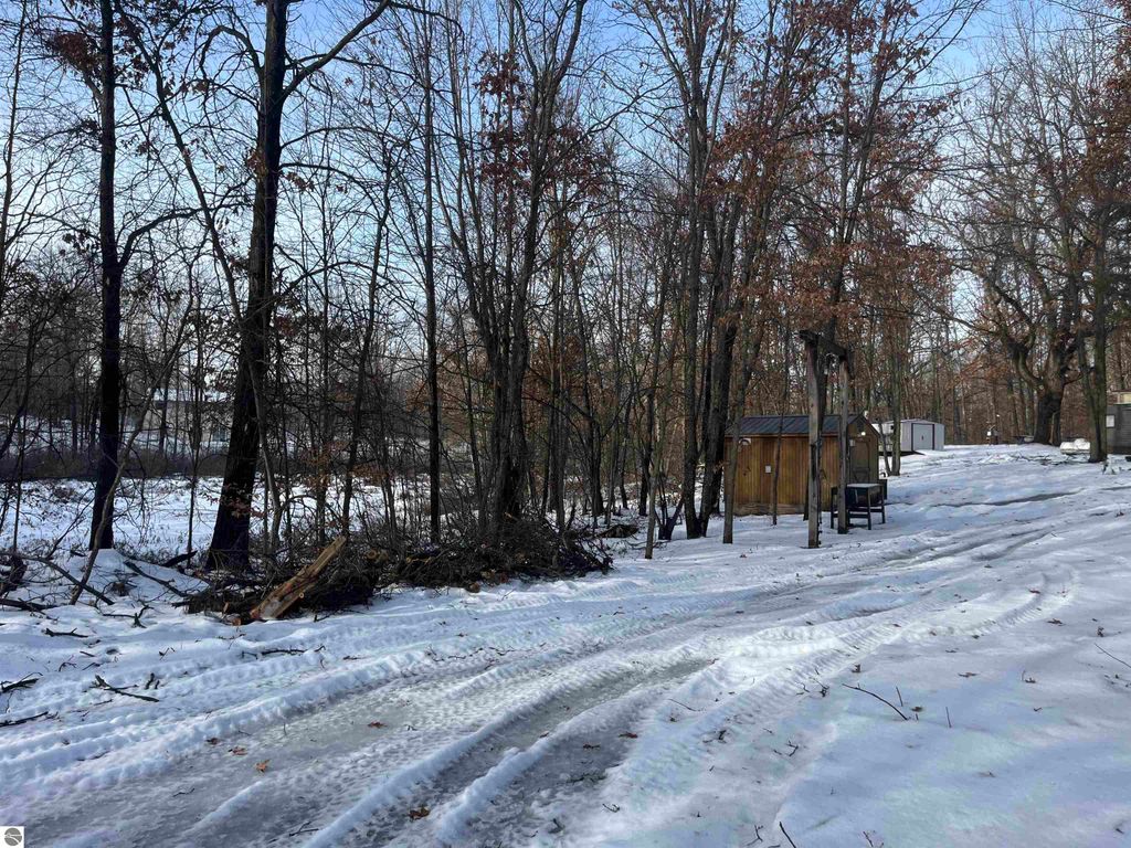 Image 1 of property listing at 7907 W Weidman Road, Weidman, MI 48893