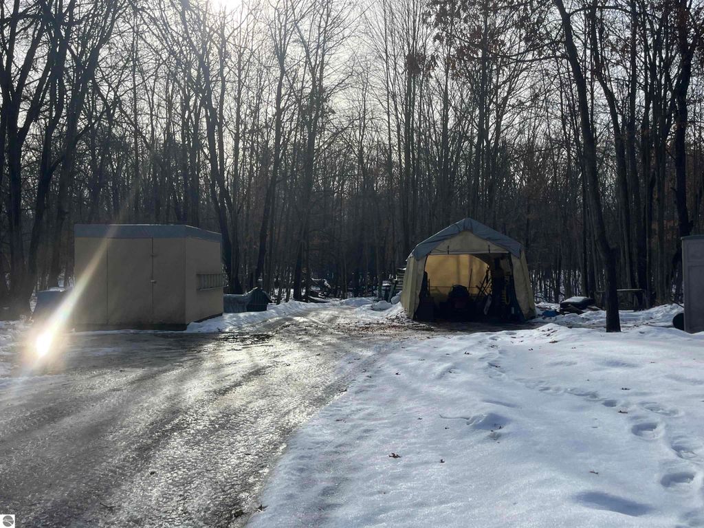 Image 6 of property listing at 7907 W Weidman Road, Weidman, MI 48893