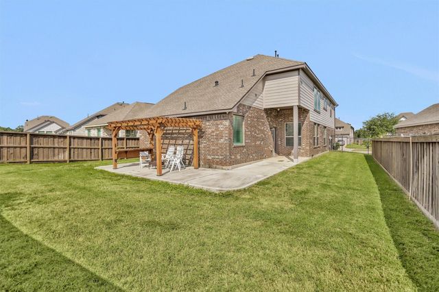 7809 Axis Ridge Drive, Magnolia, TX 77354