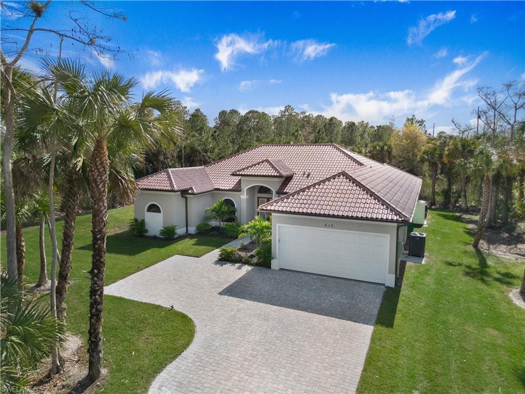 610 25th AVE NW, NAPLES, FL 34120 — exterior