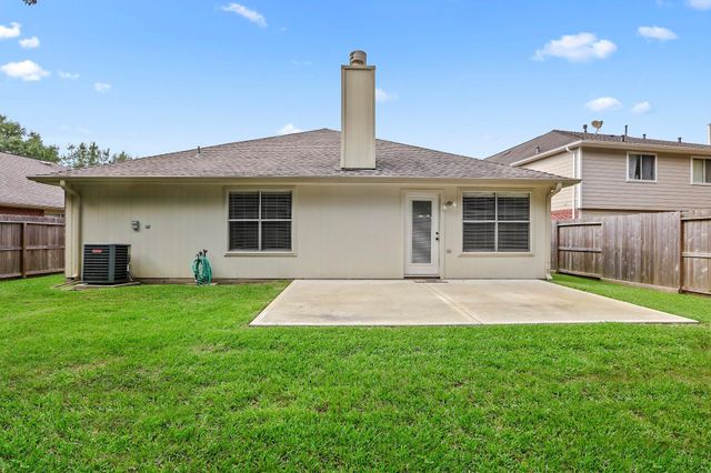 21803 Whispering Forest Drive, Kingwood, TX 77339