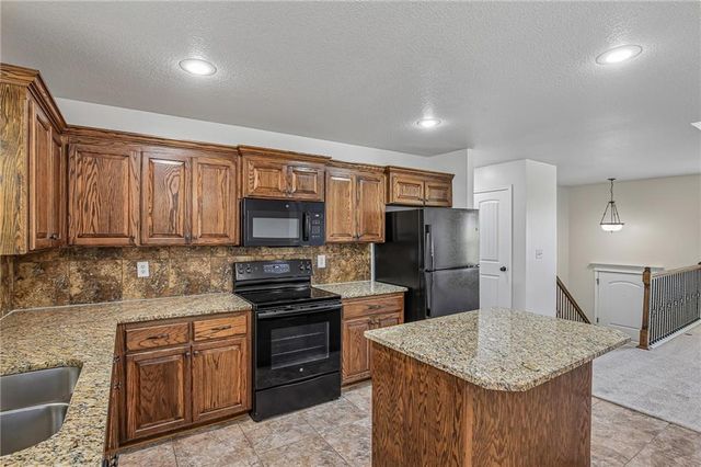 1614 NW Hilltop Lane, Grain Valley, MO 64029