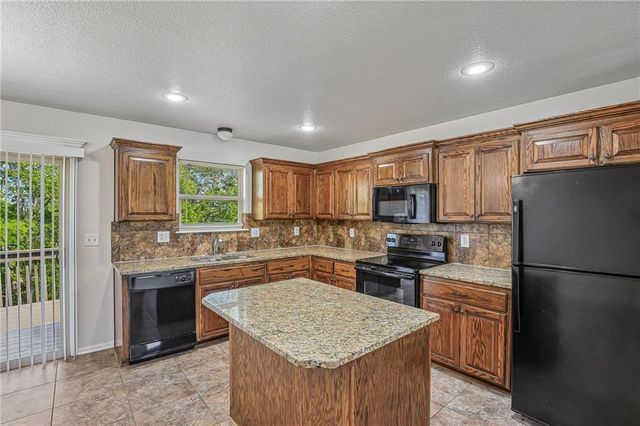 1614 NW Hilltop Lane, Grain Valley, MO 64029