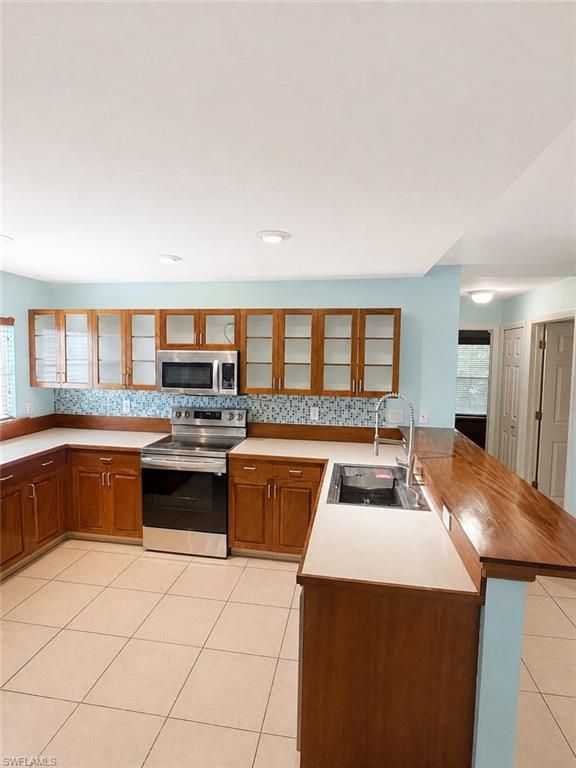 2038 NW 3rd TER, CAPE CORAL, FL 33993 — photo 4