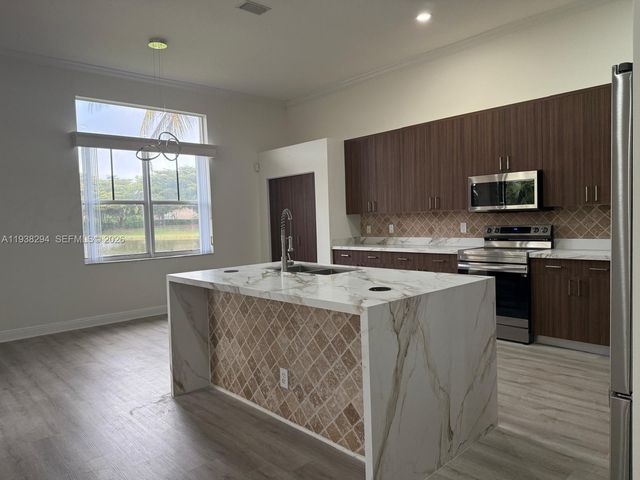 2408 Deer Creek Rd, Weston, FL 33327