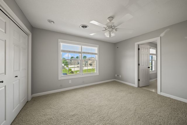 307 S TOMBERGS Drive, Eldridge, IA 52748