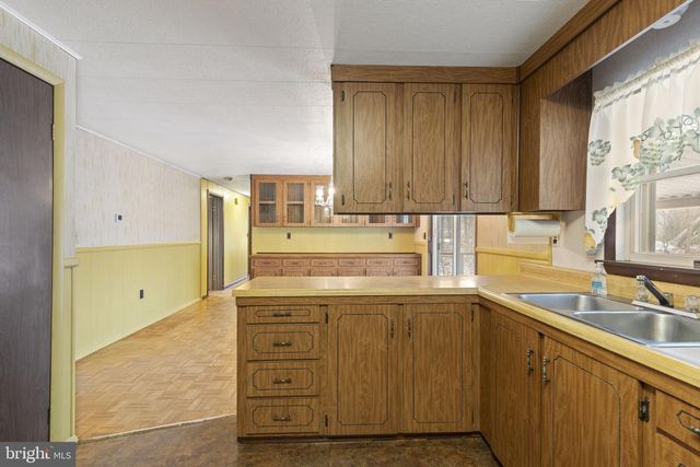 1409 MAPLE AVE, Baltimore, MD 21221