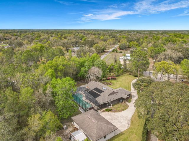 2420 QUAILS ROOST PLACE, De Leon Springs, FL 32130