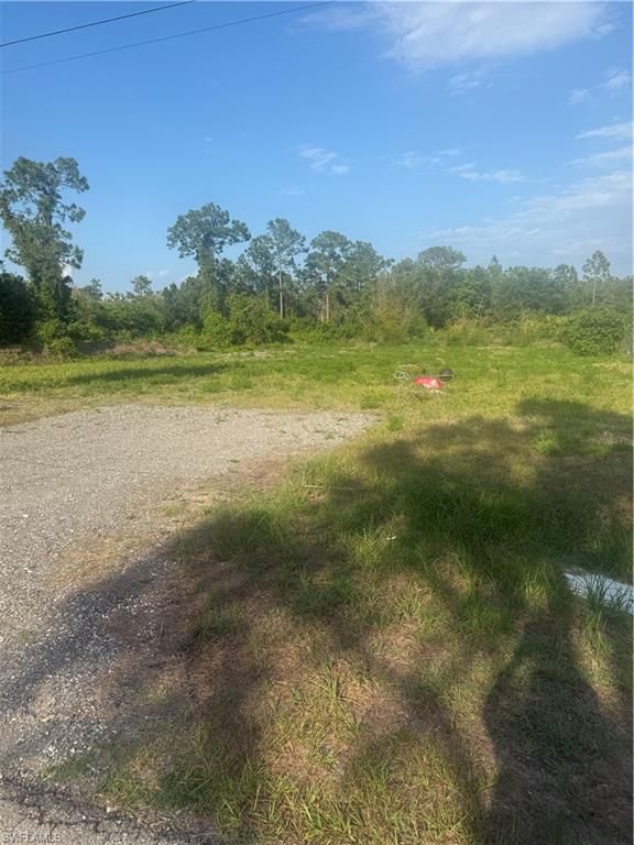 322 Wellington AVE, LEHIGH ACRES, FL 33936 — exterior