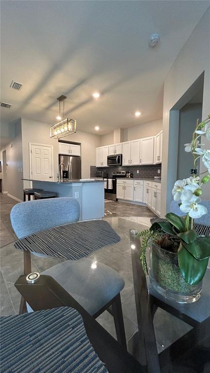 Image 23 of property listing at 9475 OAKLEAF HAMMOCK PLACE, Seffner, FL 33584