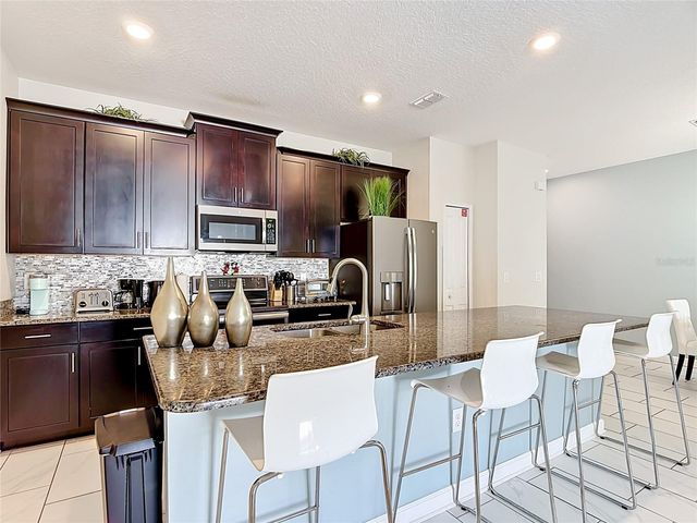 9077 DOGLEG DRIVE, Davenport, FL 33896