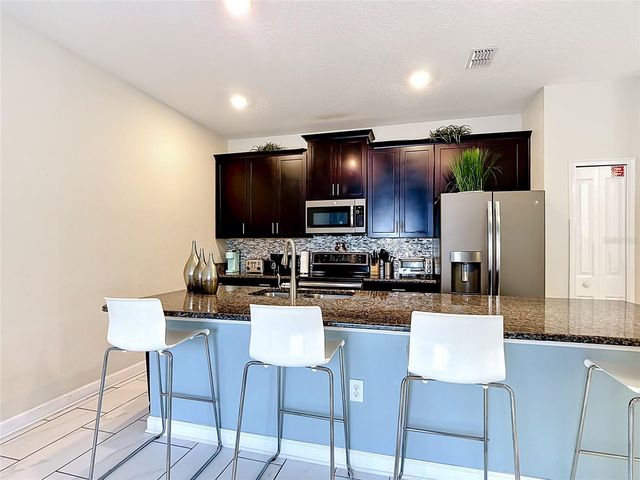 9077 DOGLEG DRIVE, Davenport, FL 33896