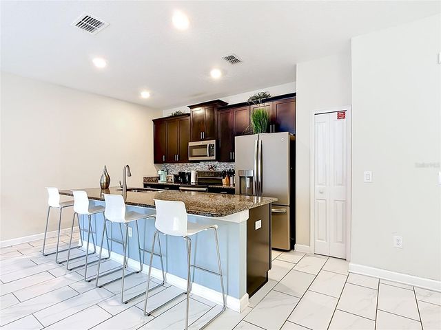 9077 DOGLEG DRIVE, Davenport, FL 33896